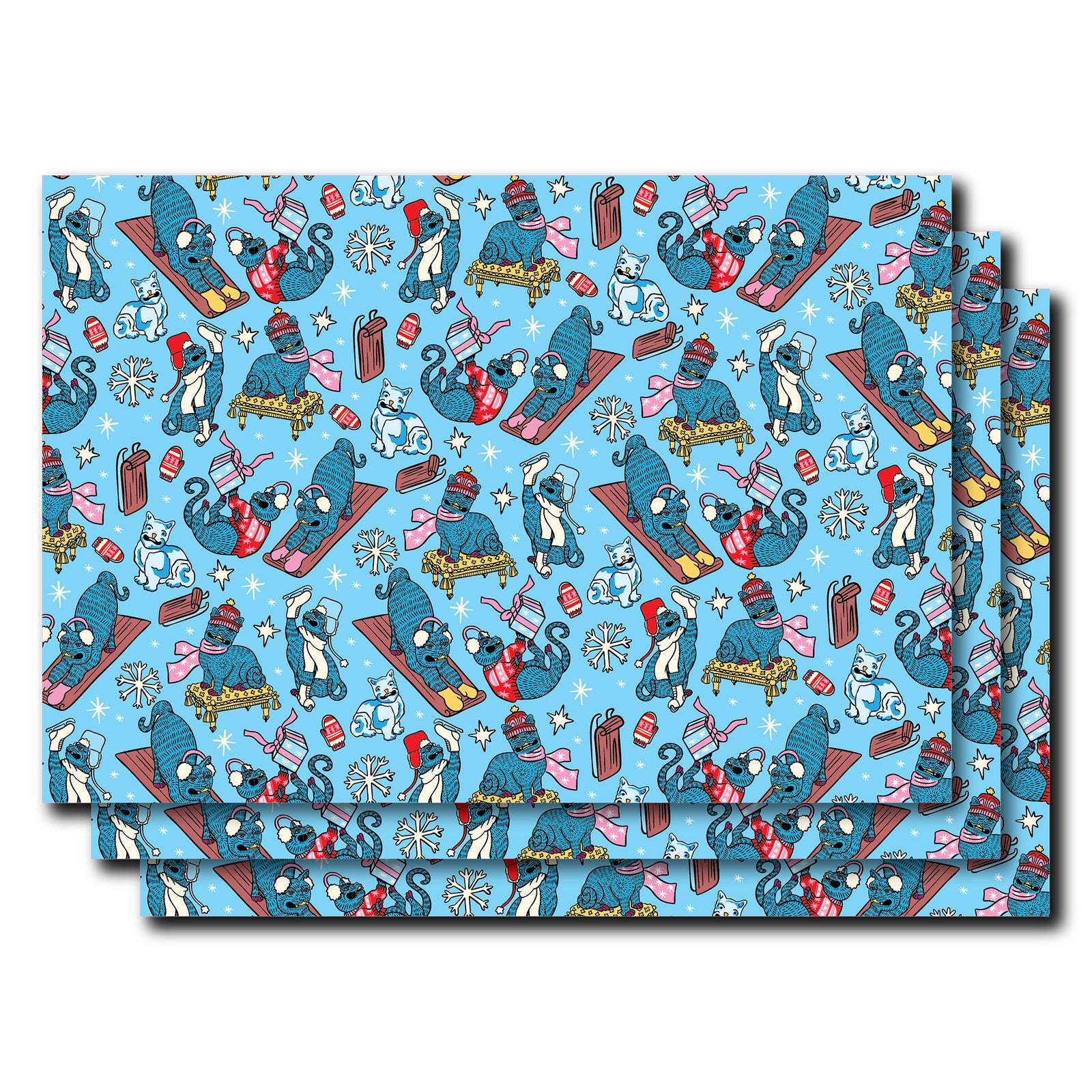 Three sheets of blue wrapping paper with festive animal pattern on a white background