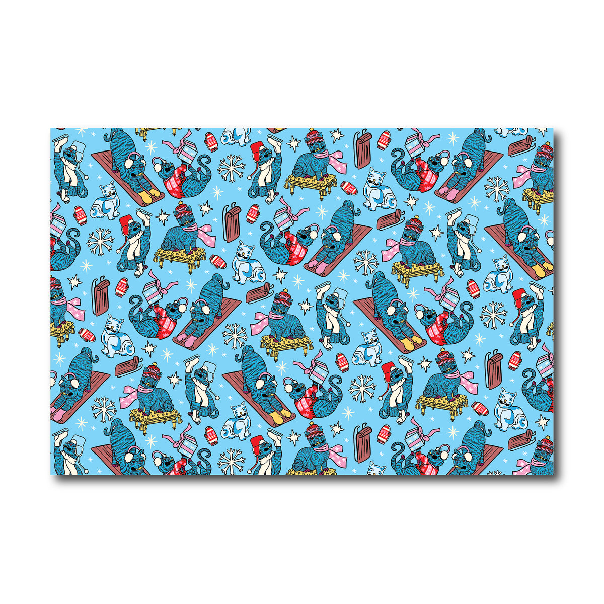 Patterned paper with cartoon cats on a blue background