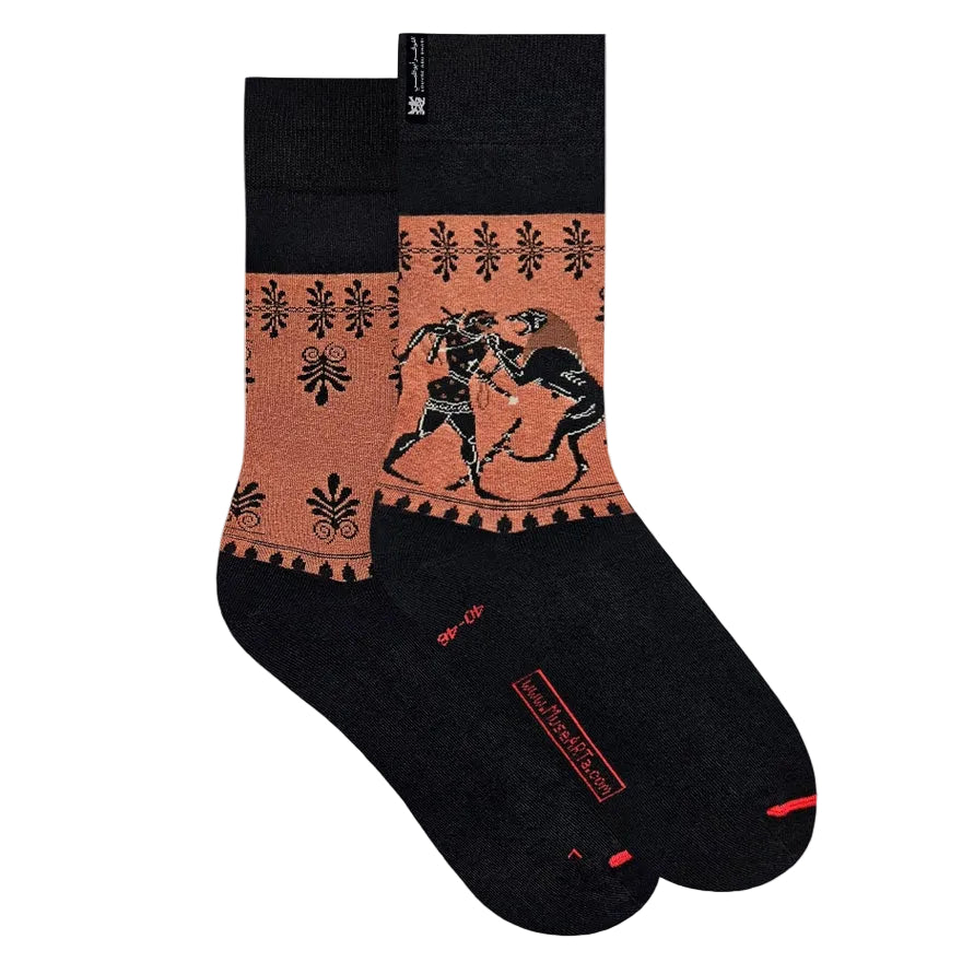 Black socks with a red and black pattern on a white background