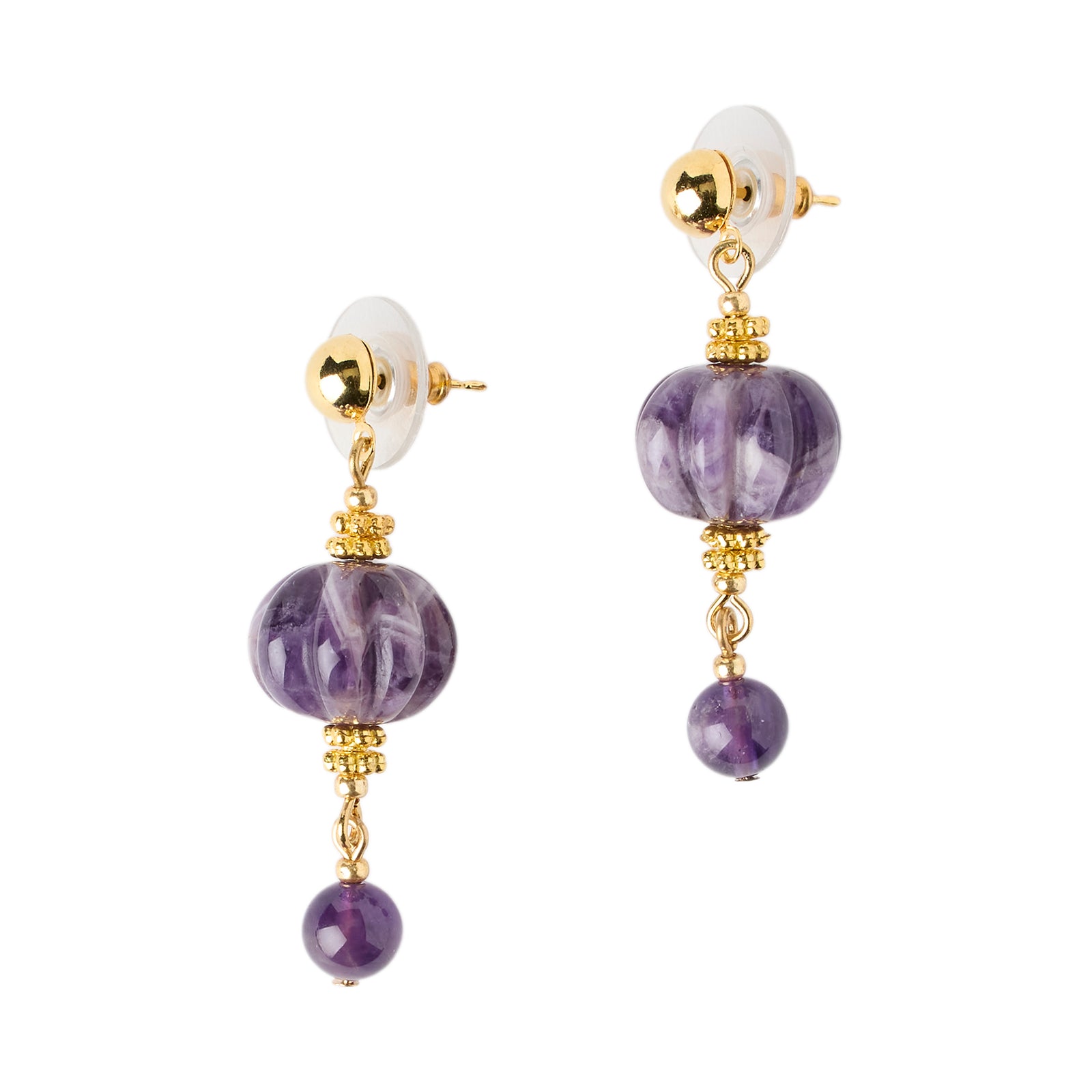 Pair of earrings with purple beads and gold accents on a white background