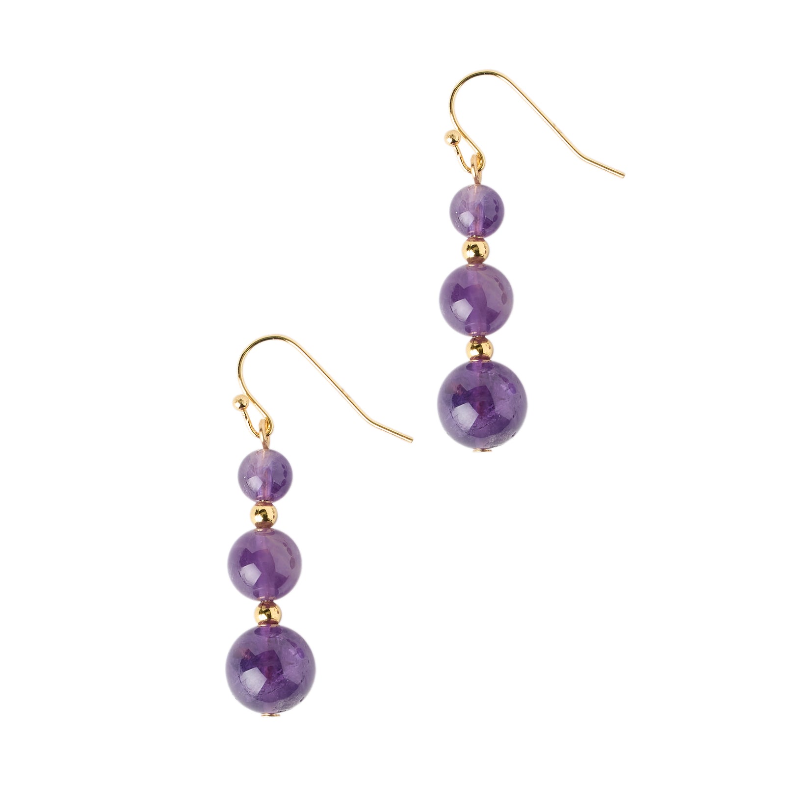 Purple beaded earrings with gold hooks on a white background