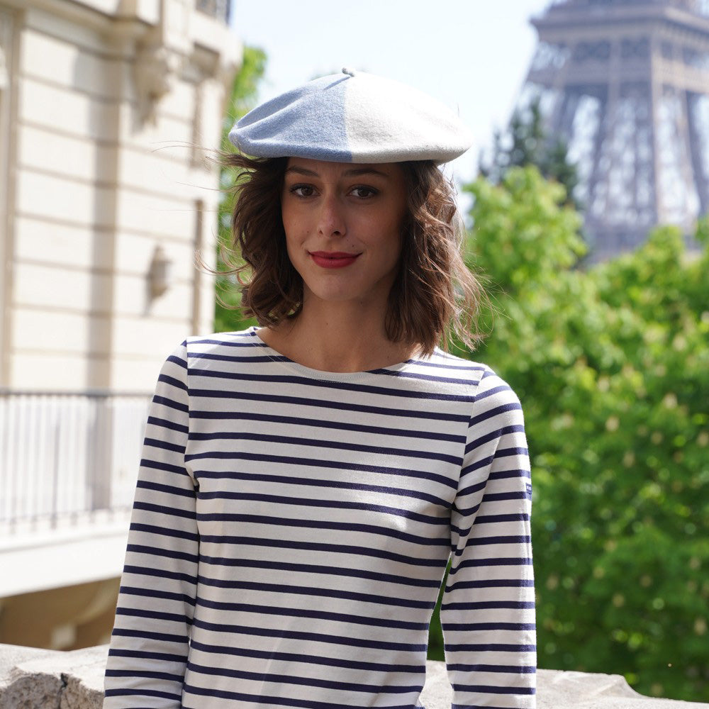 Beret with blue and beige design on a white background
