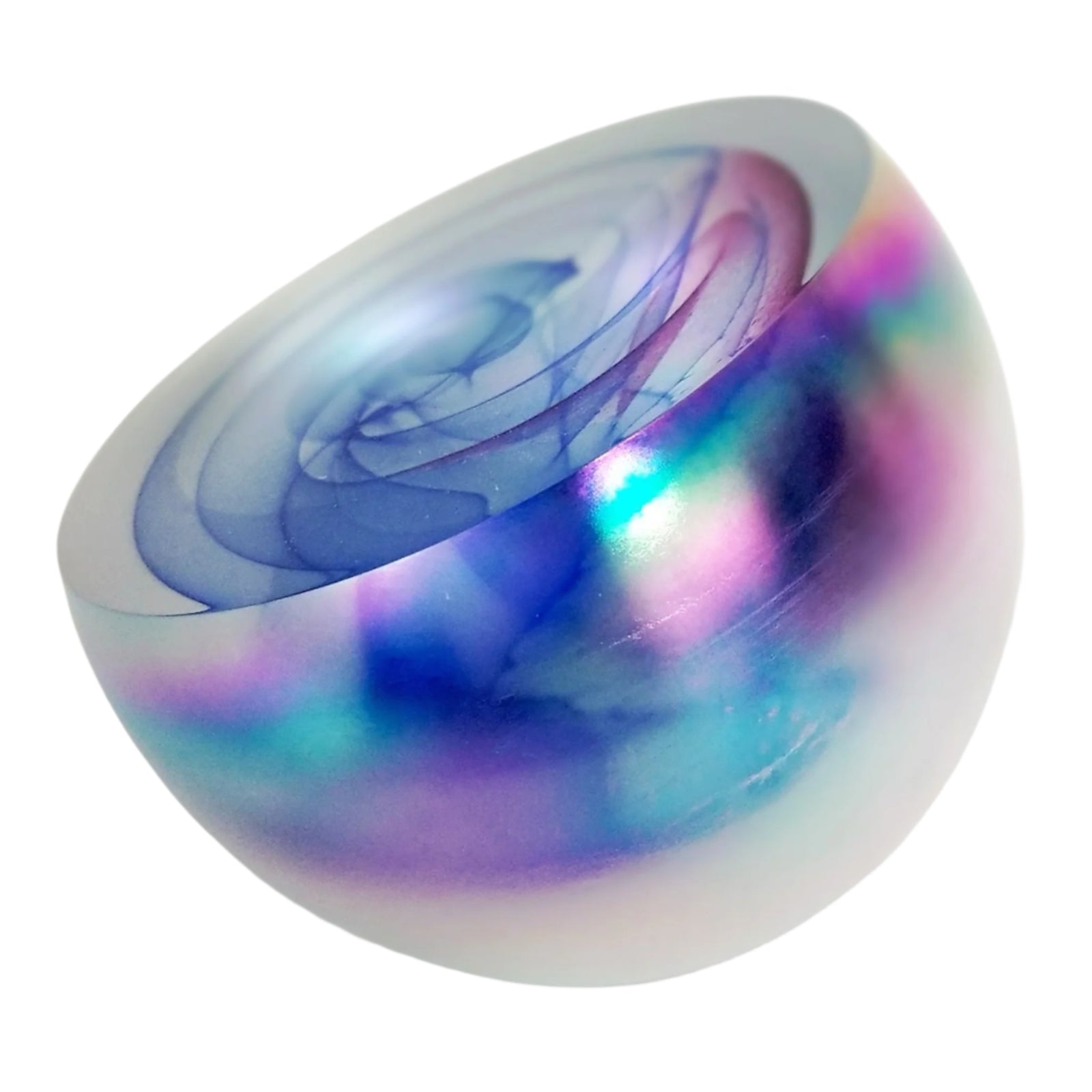 A round glass paperweight with blue and rose swirls, and a mother of pearl exterior.