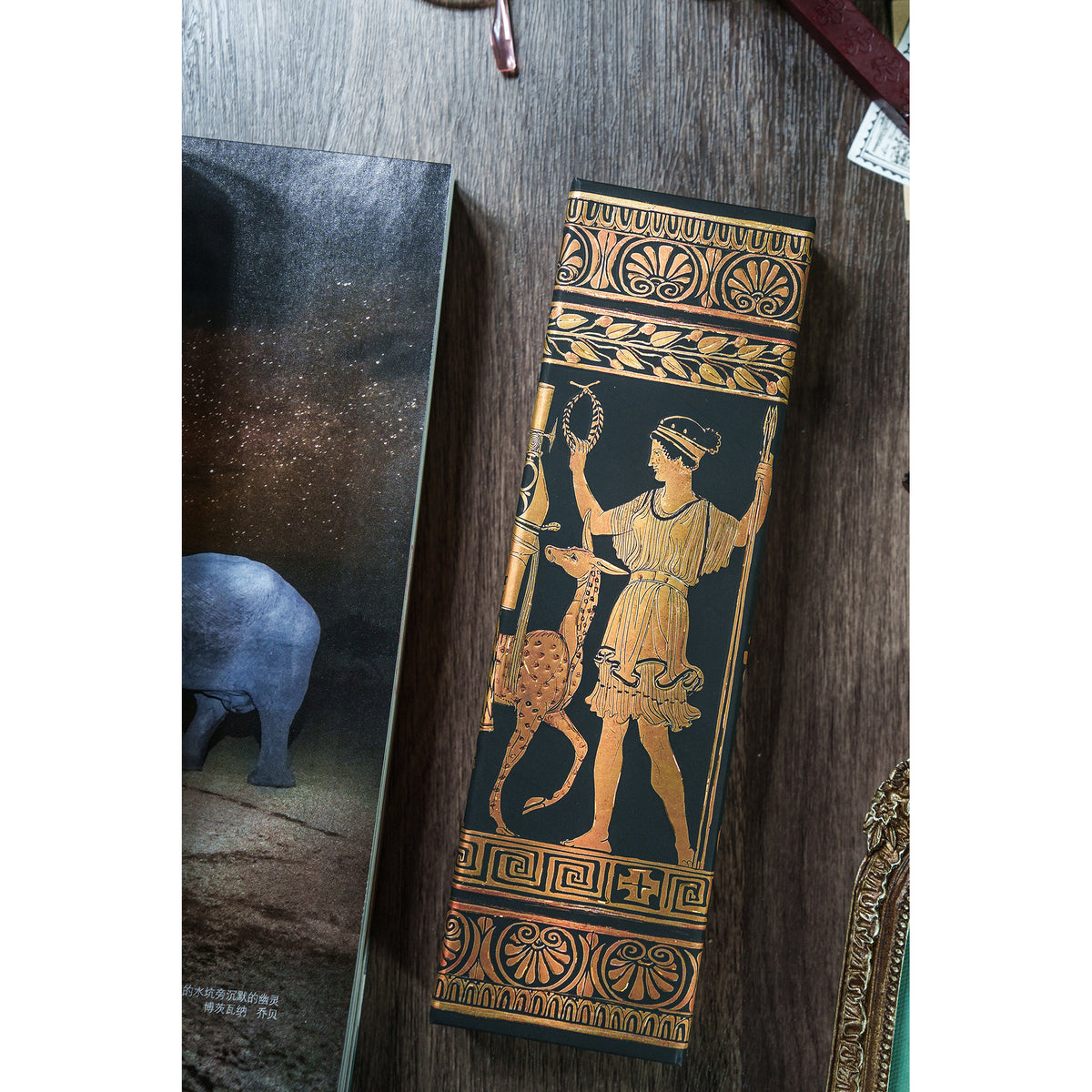 Decorative long box with classical design on a wooden surface