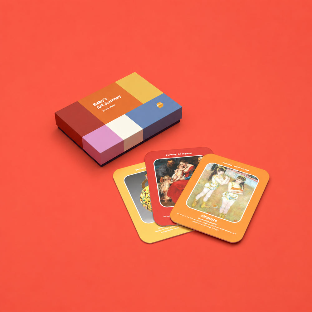 A boxed card game set titled "Baby's Art Journey", with three colorful cards fanned out in front. The box and cards feature a retro color-blocked design in red, orange, yellow, blue, purple, and white, with vintage-style illustrations on the cards.