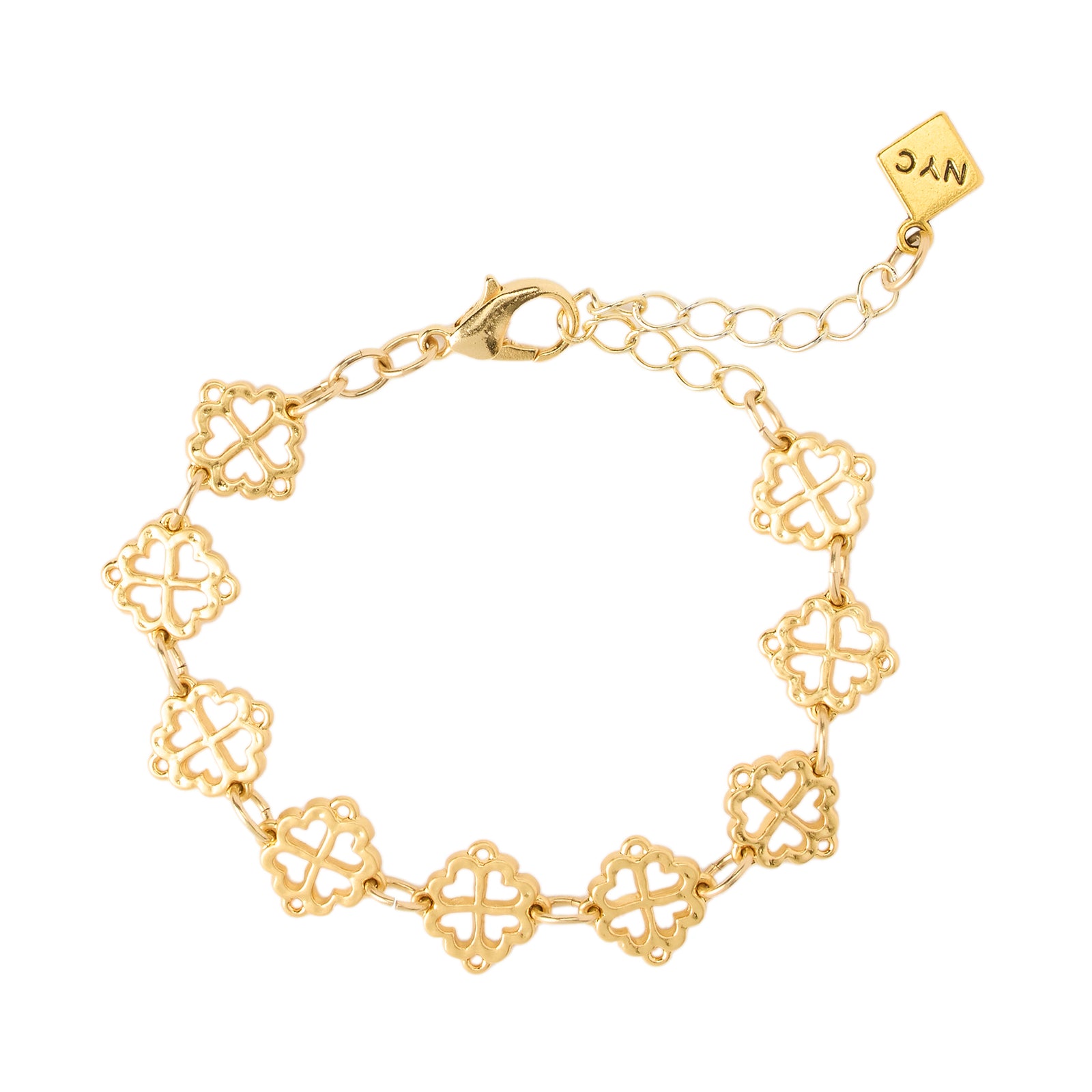 Gold bracelet with intricate designs on a white background