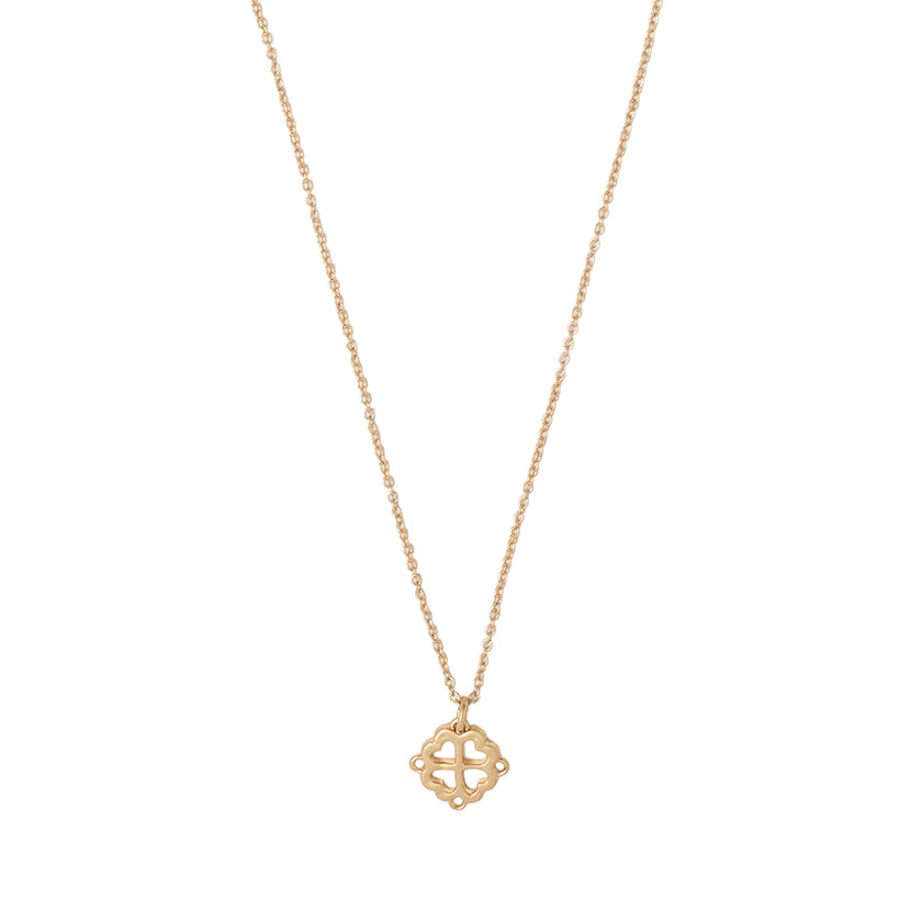 A delicate gold chain necklace featuring a small, openwork geometric cross pendant, displayed against a solid white background.