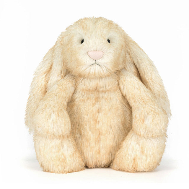 Plush bunny toy on a white background