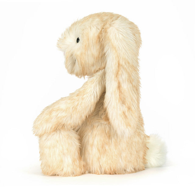 Plush bunny toy on a white background
