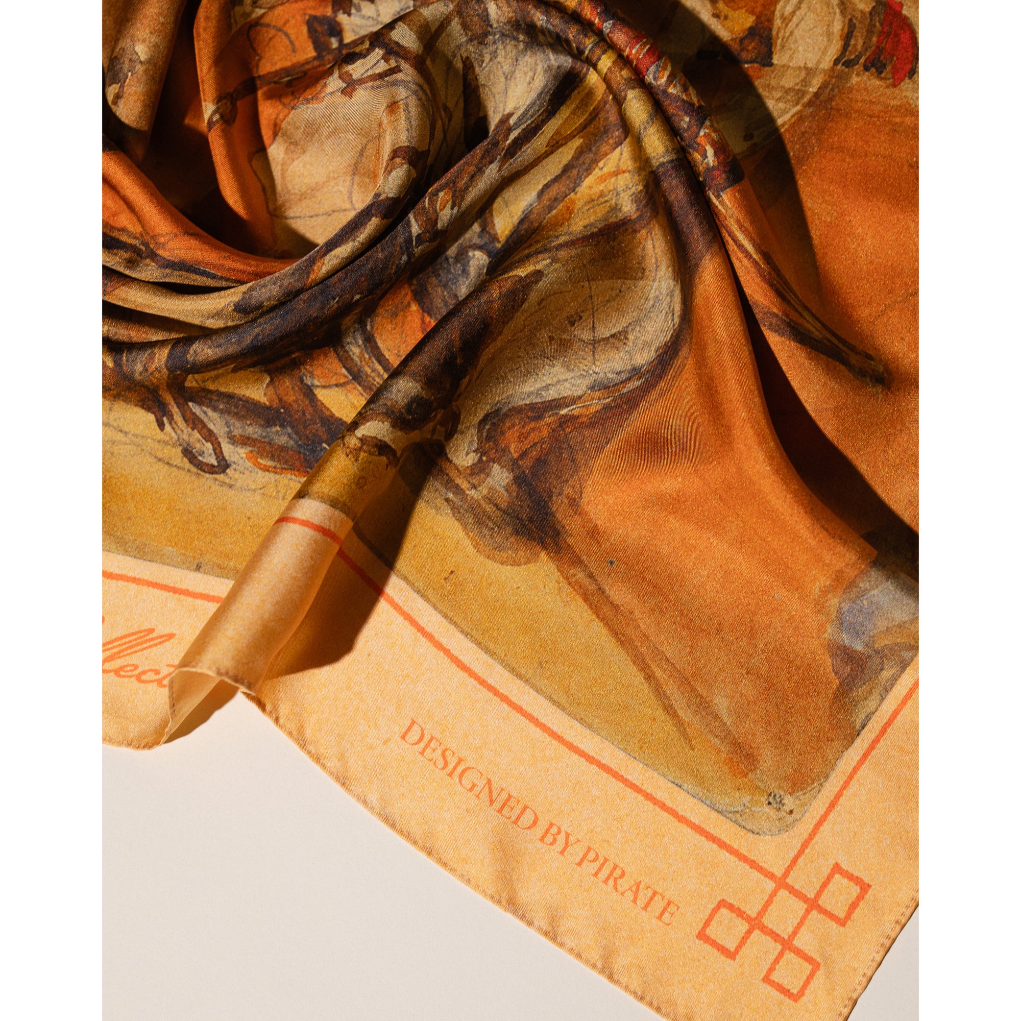 Silk scarf with a bullfighting scene design on a white background