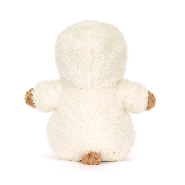 Stuffed animal in a white hooded outfit on a white background