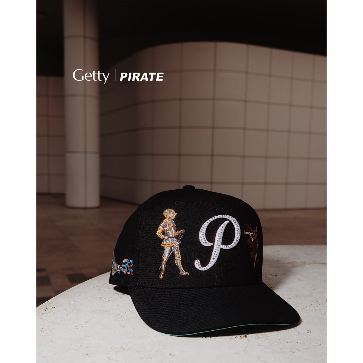 Black cap with skeleton and 'P' design on a tiled floor, featuring Getty and Pirate logos.