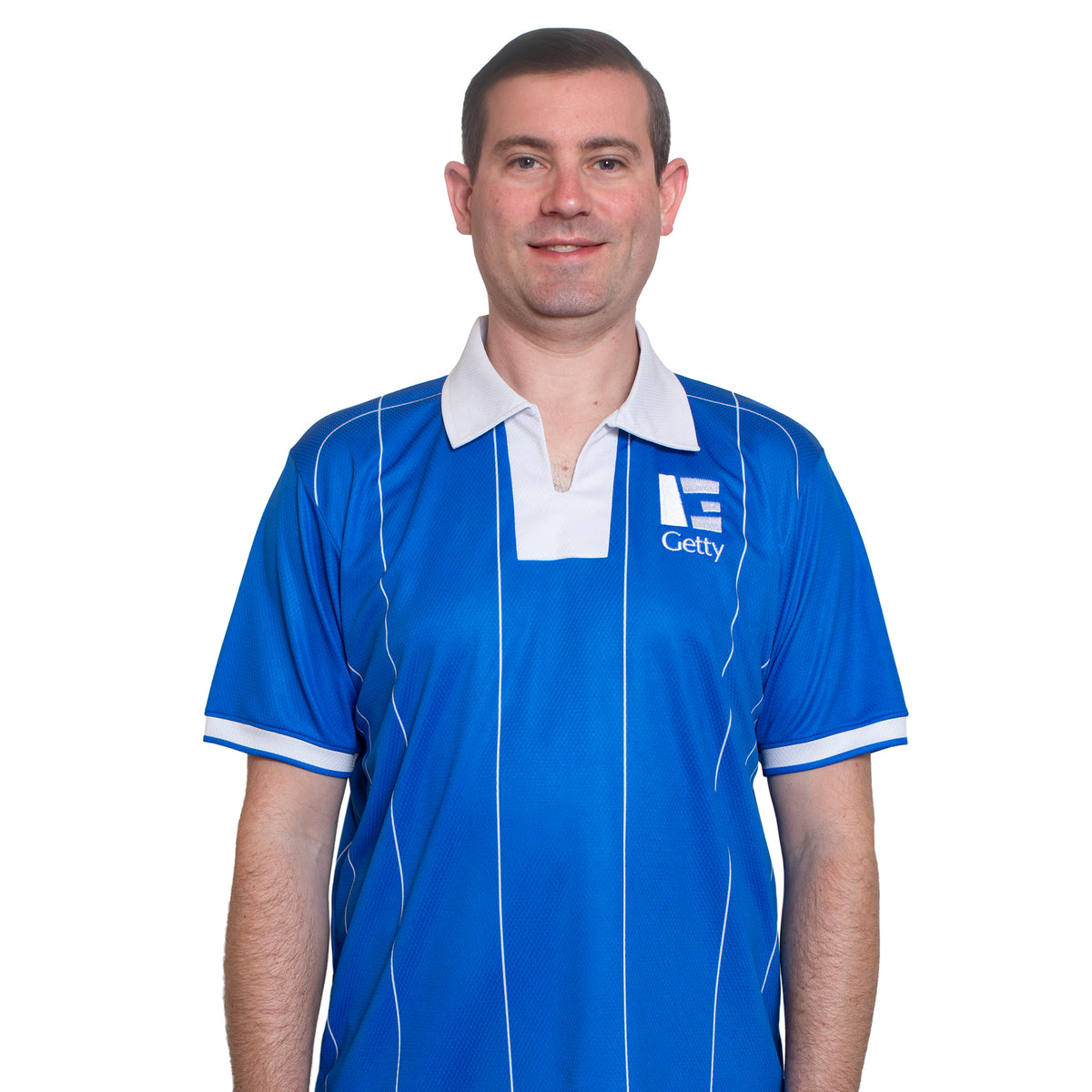 Man wearing a blue sports jersey with Getty logo on a white background