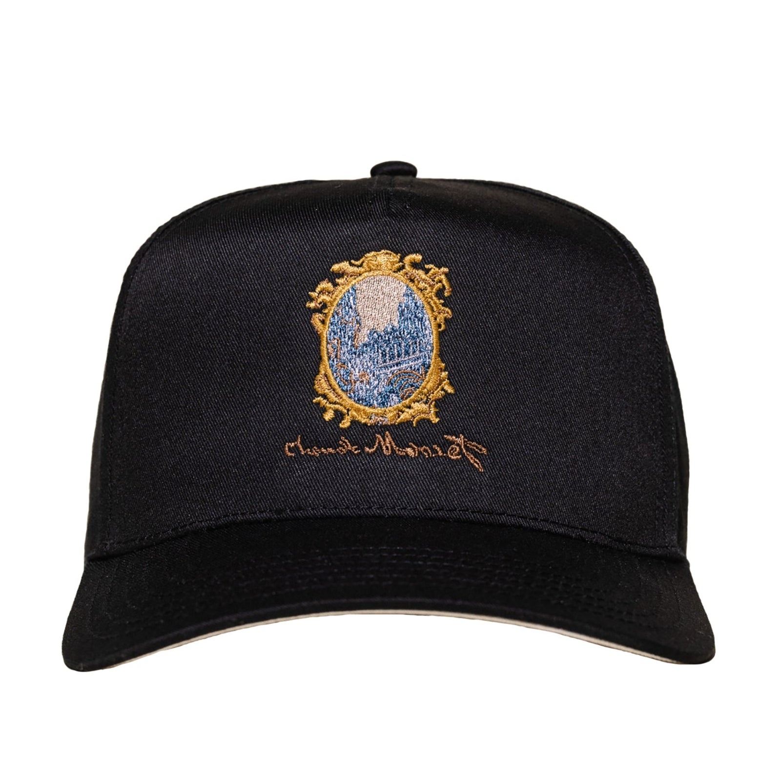 Black cap with embroidered design on a white background