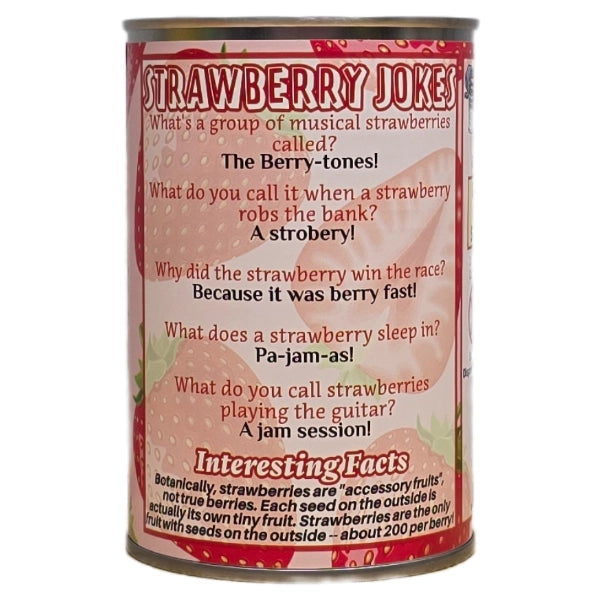 Plush strawberry toy next to a can of 'Canned Strawberry' with a cartoon strawberry on the label.