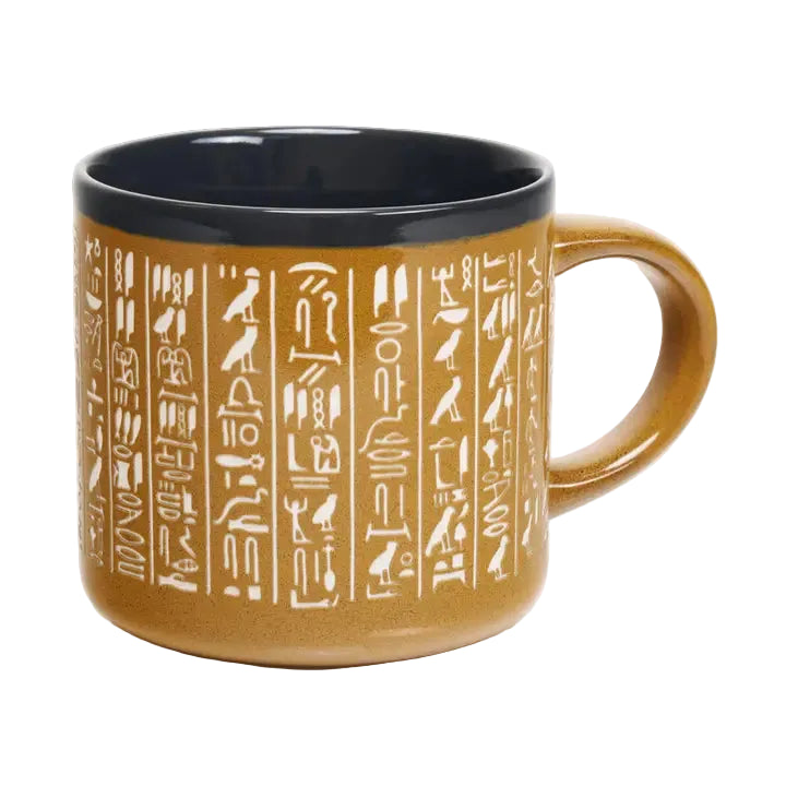 Mug with hieroglyphic designs on a white background