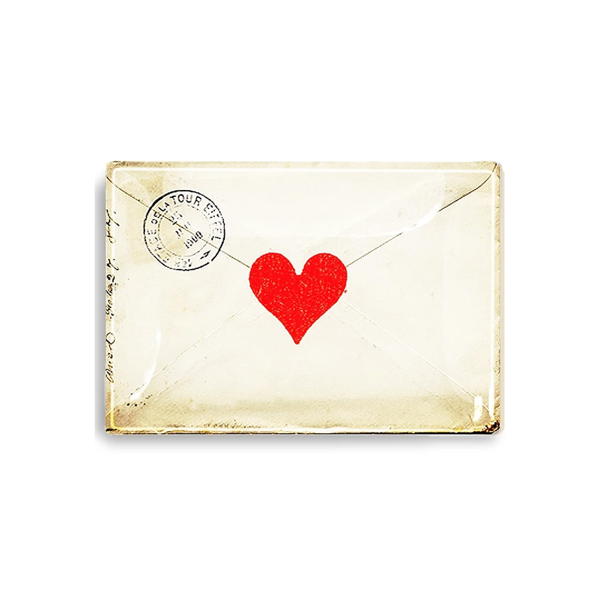 Decorative tray featuring a vintage envelope with a red heart and a stamp on a white background
