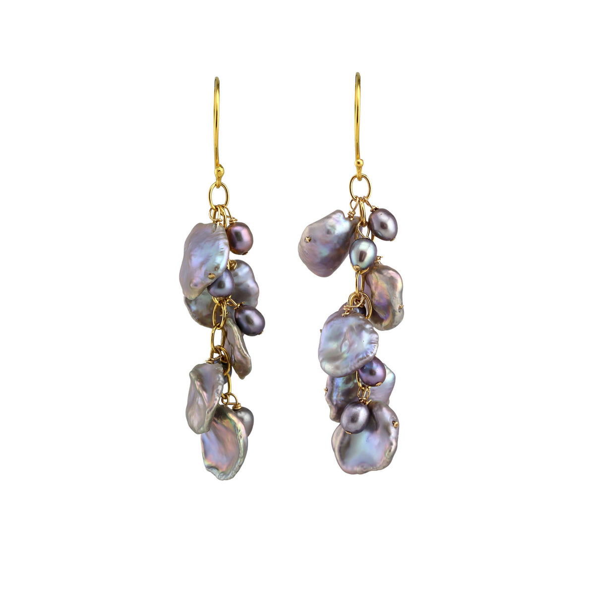 Pair of pearl earrings with gold hooks on a white background