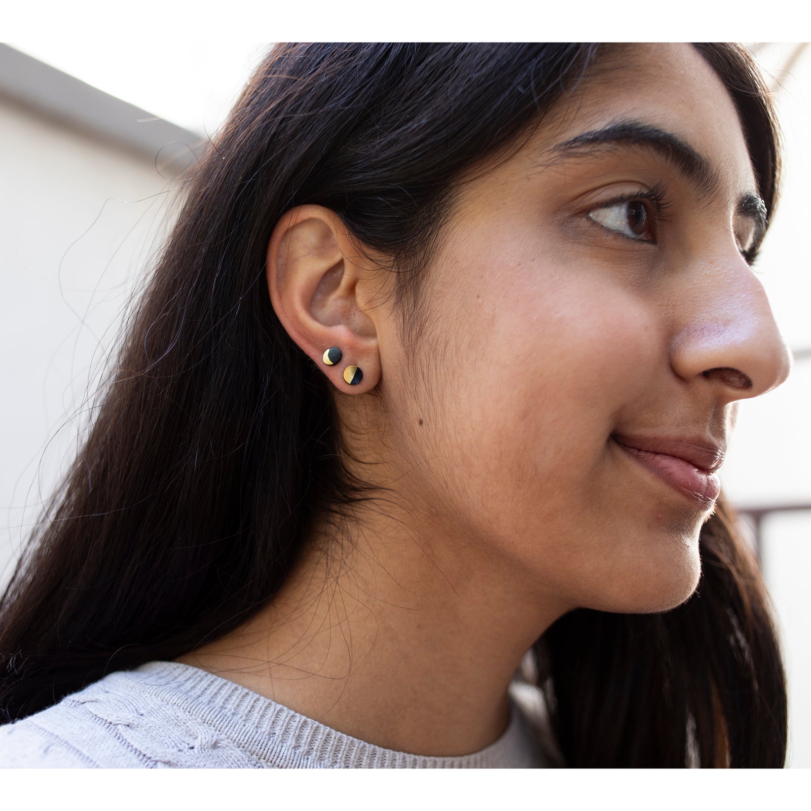 Set of earrings on a 'Getty' branded card