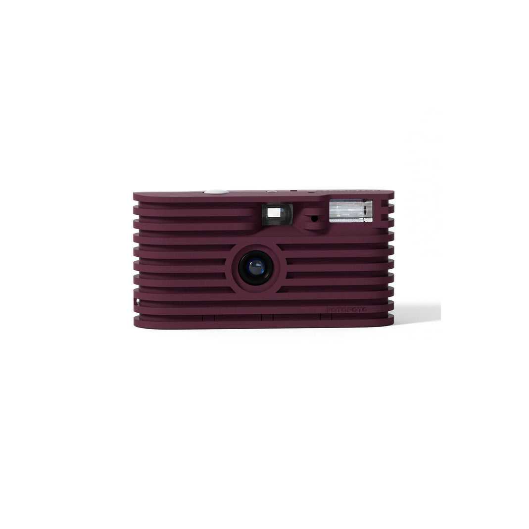A compact rectangular projector in a deep burgundy color with a ribbed metal body, shown from the front against a plain white background.