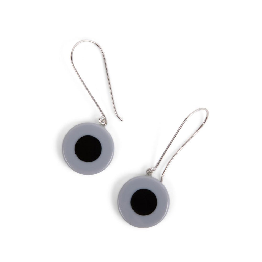 A pair of long wire earrings with gray and black resin beads attached to sterling silver ear wires.