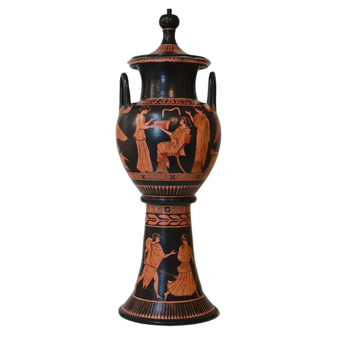 A hand-painted terracotta Greek vase with geometric patterns and figures depicting a wedding scene.