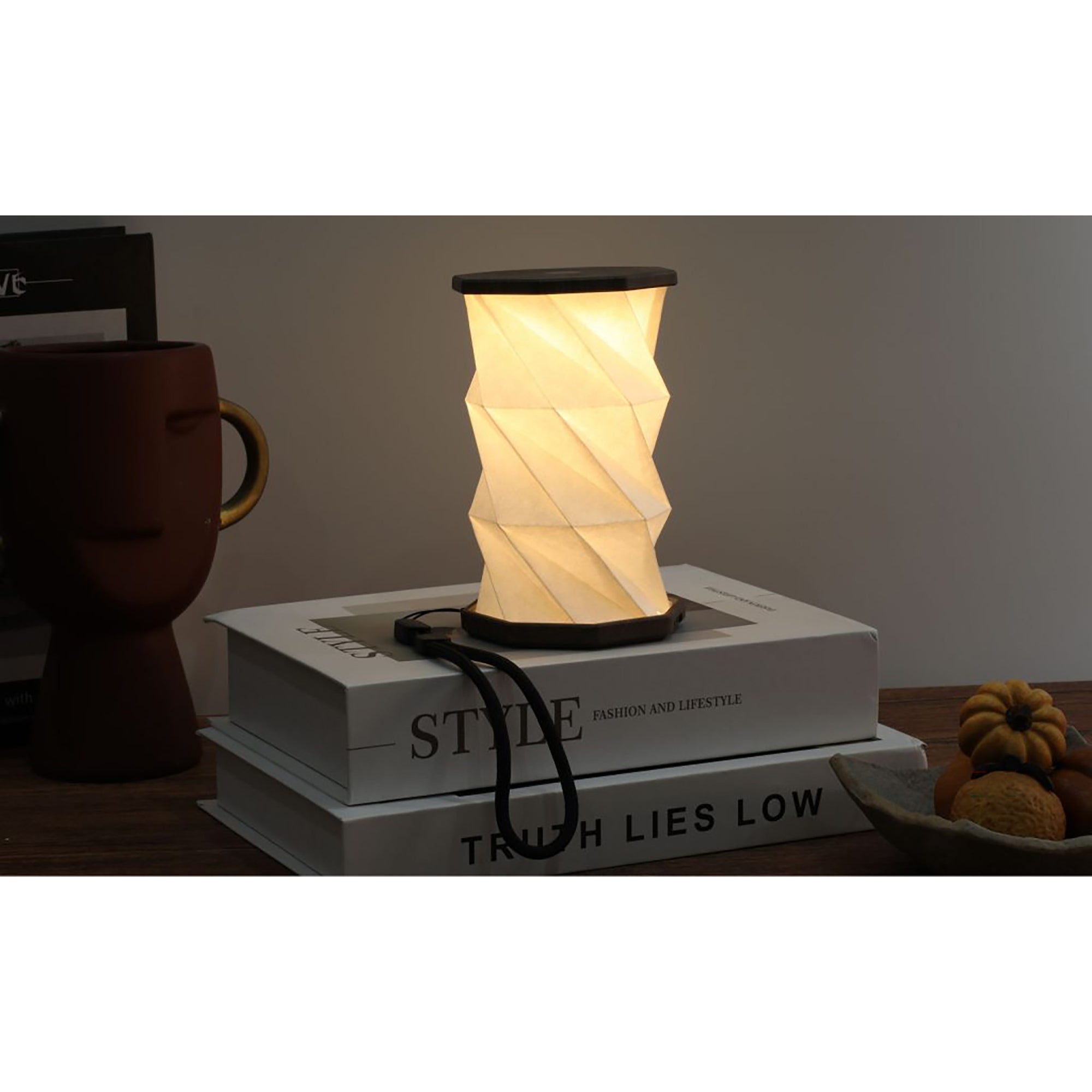 Modern outdoor wall light fixture with a textured shade on a white background