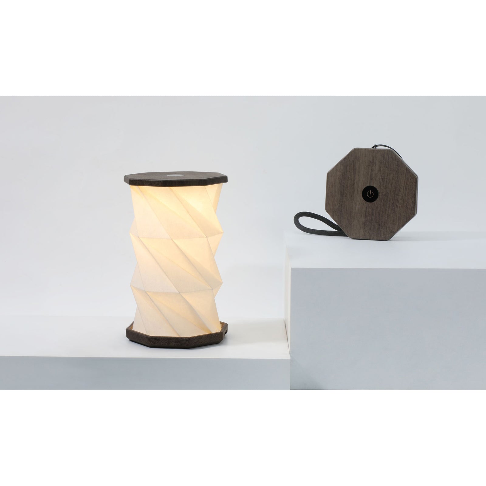 Modern table lamp with a twisted design on a white background