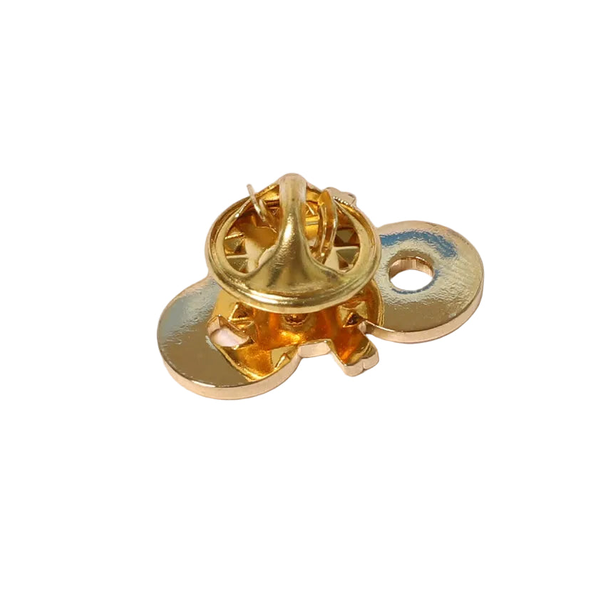Gold pin with a unique spiral design on a white background