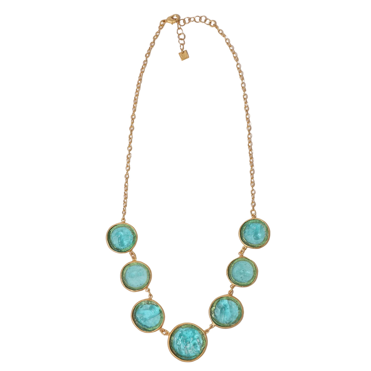 Necklace with turquoise circular pendants on a white background