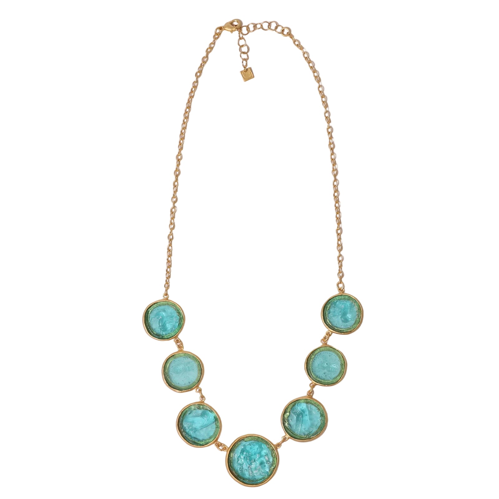 Necklace with turquoise circular pendants on a white background