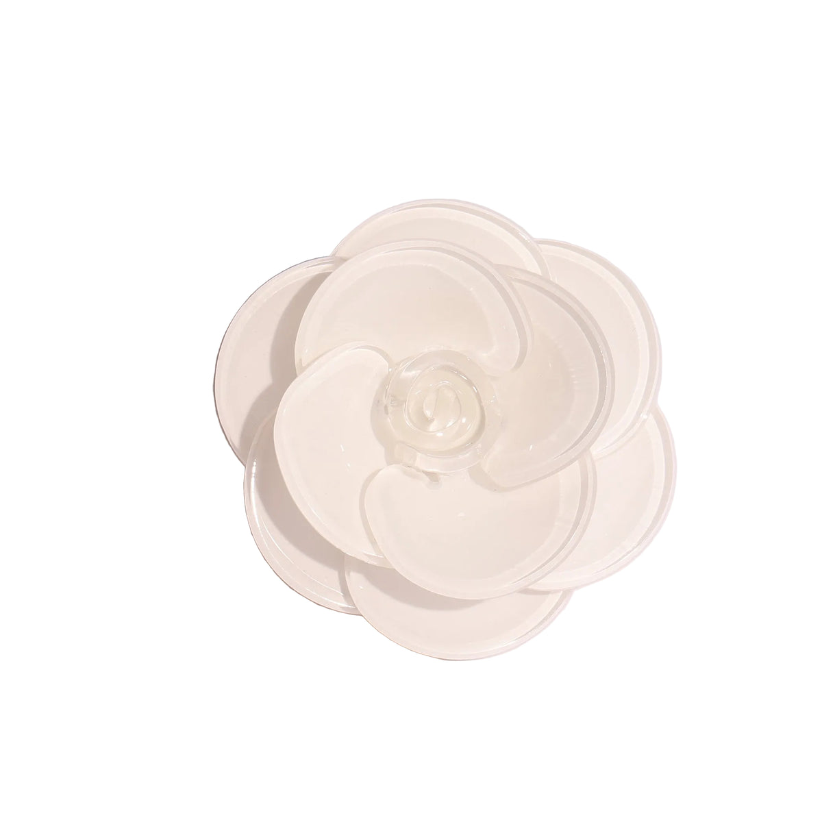White flower-shaped object on a light purple background