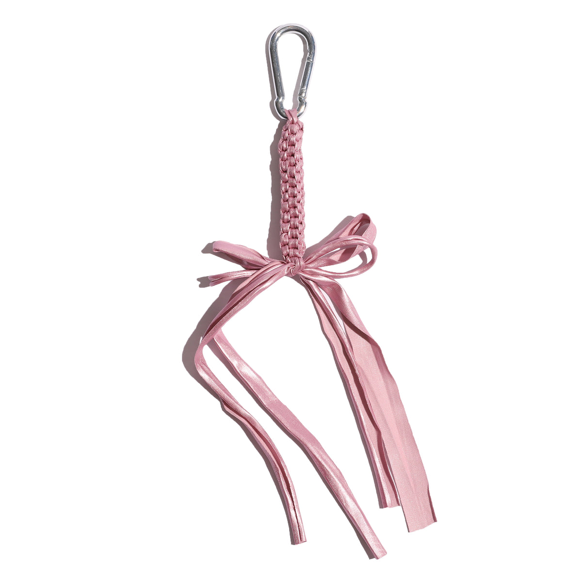 Pink braided ribbon with a bow and carabiner on a white background