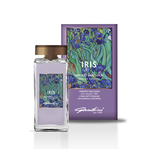 A bottle of Iris Eau de Toilette with a purple label featuring an image of Van Gogh's painting 'Irises', alongside its packaging box.
