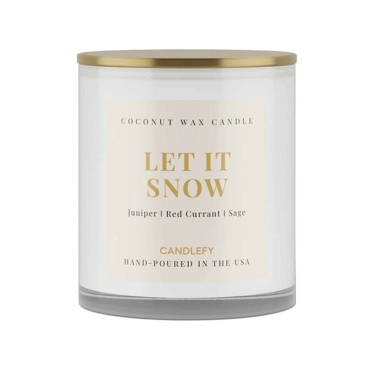 Coconut wax candle labeled &#39;Let It Snow&#39; with a gold lid on a white background