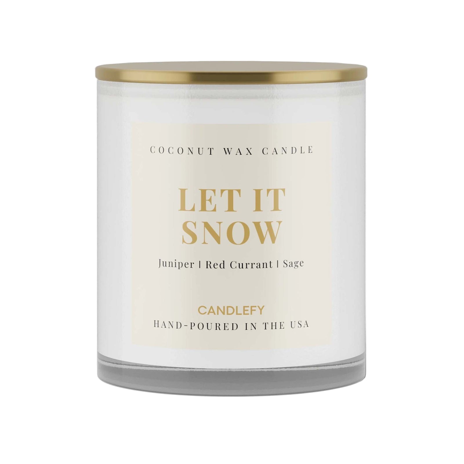 Coconut wax candle labeled 'Let It Snow' with a gold lid on a white background