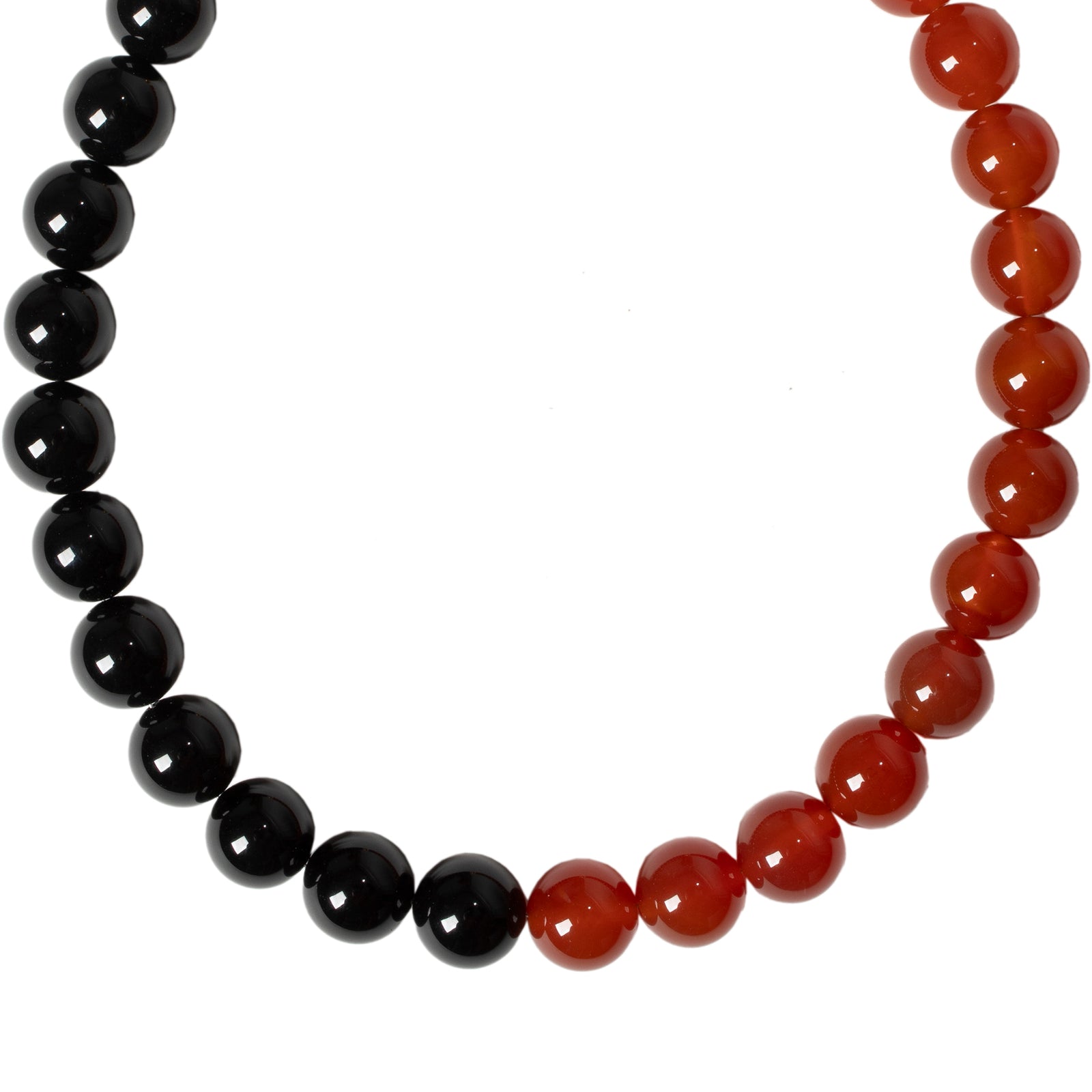 A choker necklace featuring alternating large onyx beads and carnelian beads with a magnetic clasp.