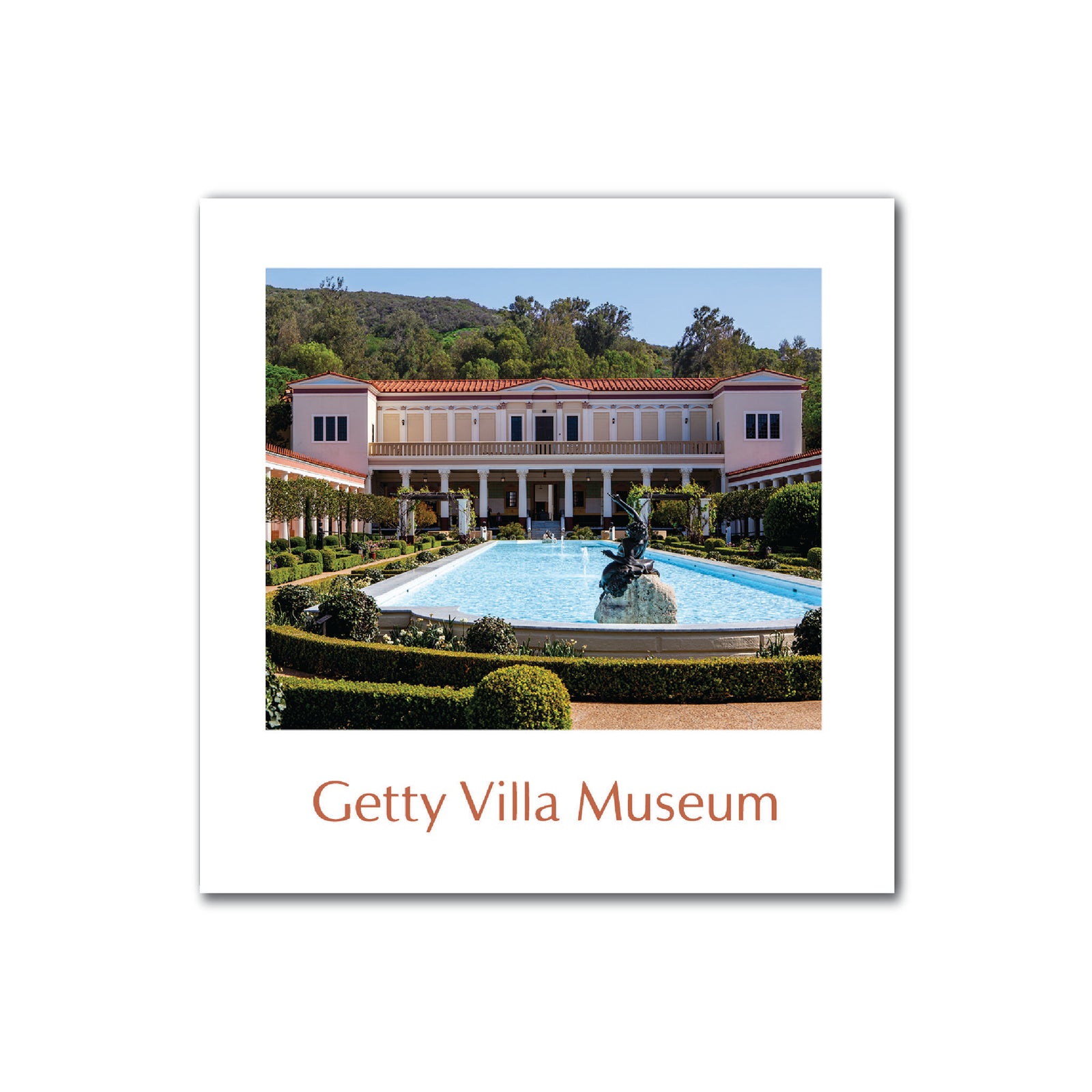 A magnet with an image of the Getty Villa Museum's Outer Peristyle Garden, featuring a classical building and a fountain.
