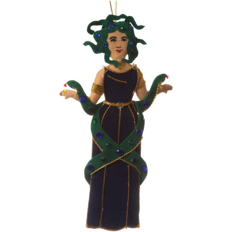 A decorative hanging ornament depicting a woman with green snake-like hair and snakes wrapping around her arms and dress, styled with gold trim and purple gem accents on a plain white background.