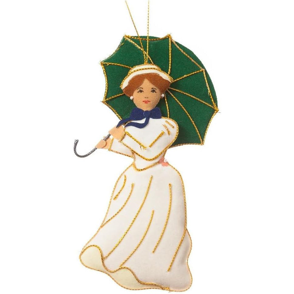 An embroidered Christmas ornament depicting a woman in a white dress holding a green parasol with gold trim, shown against a plain white background.