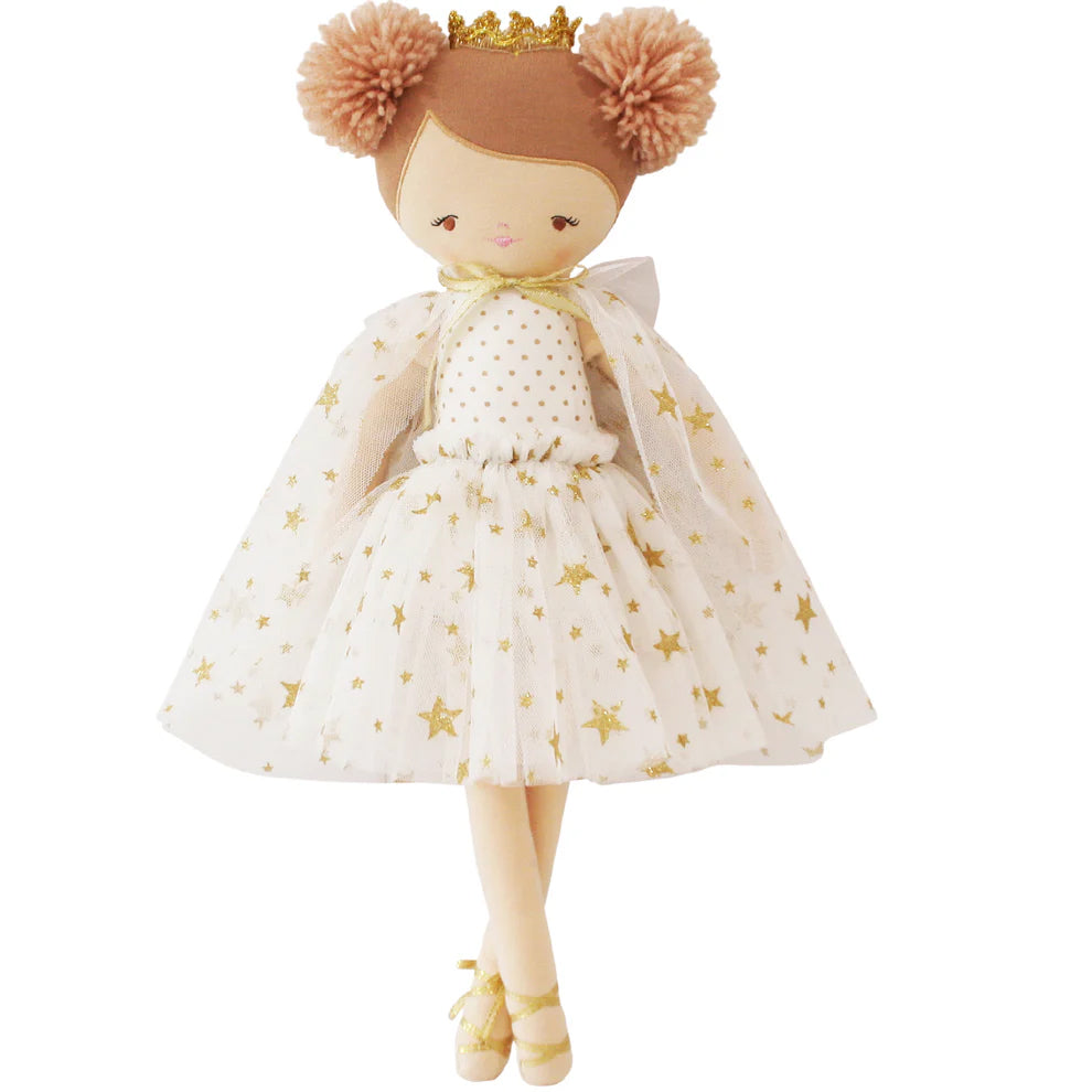 Doll in a white dress with gold stars and a crown on a white background