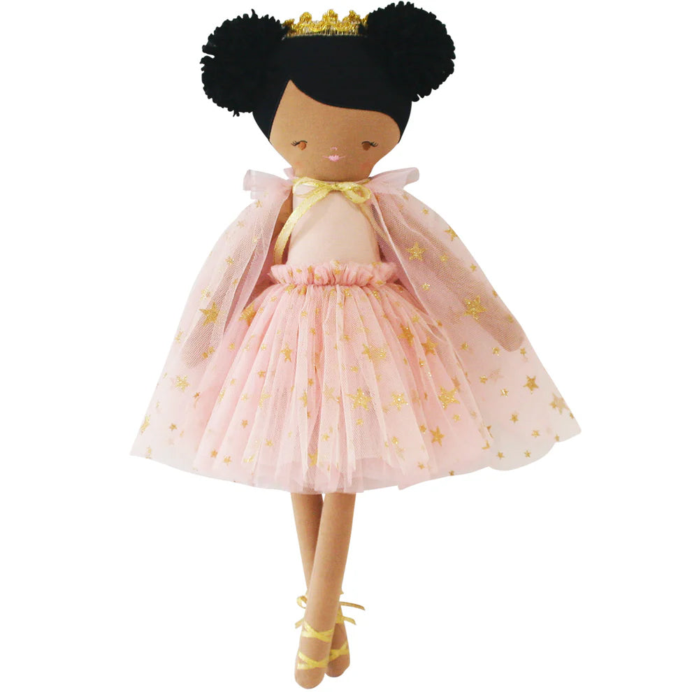 Doll with pink dress and black hair on a white background