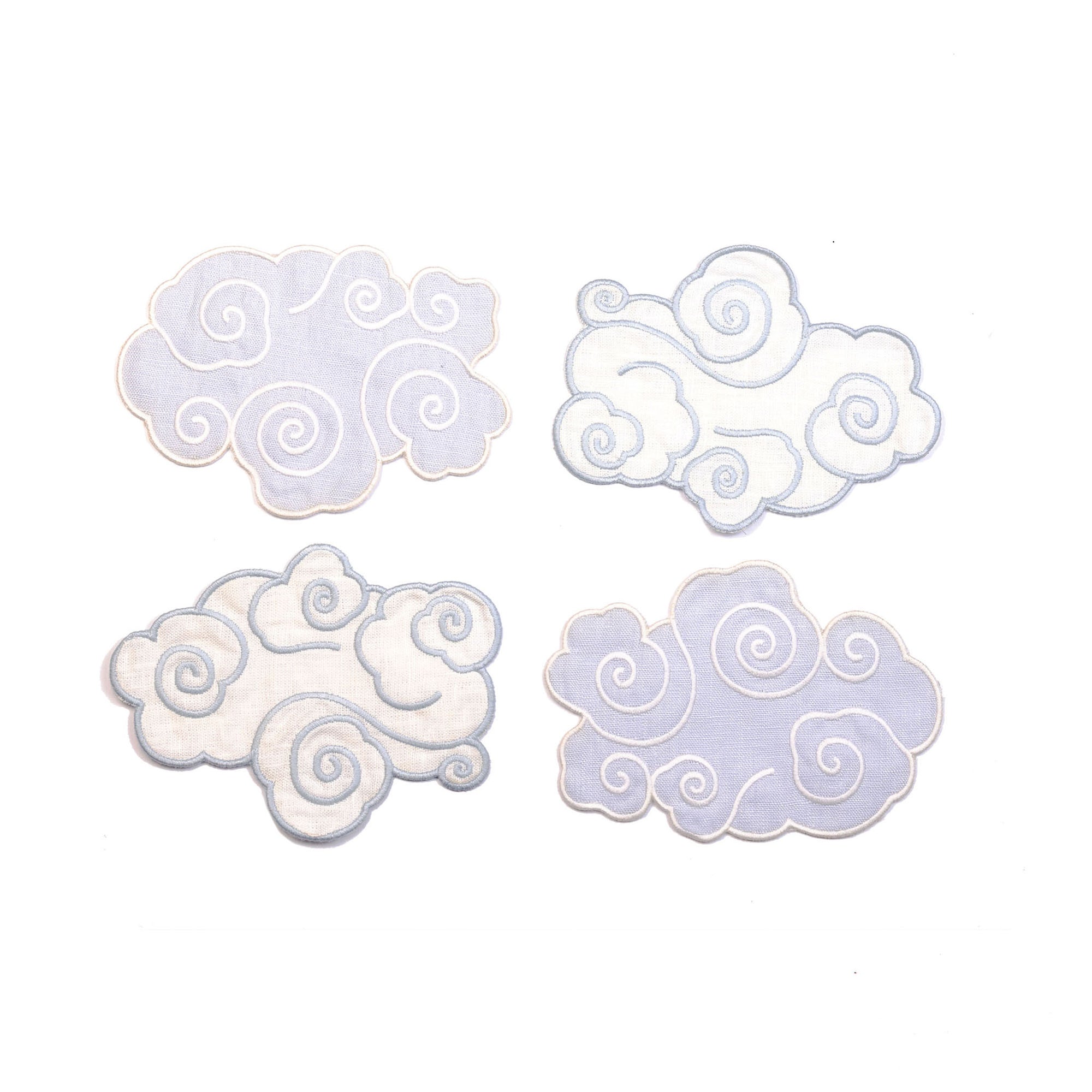 Pack of cloud-shaped cocktail napkins on a purple background with 'Piecework' branding.