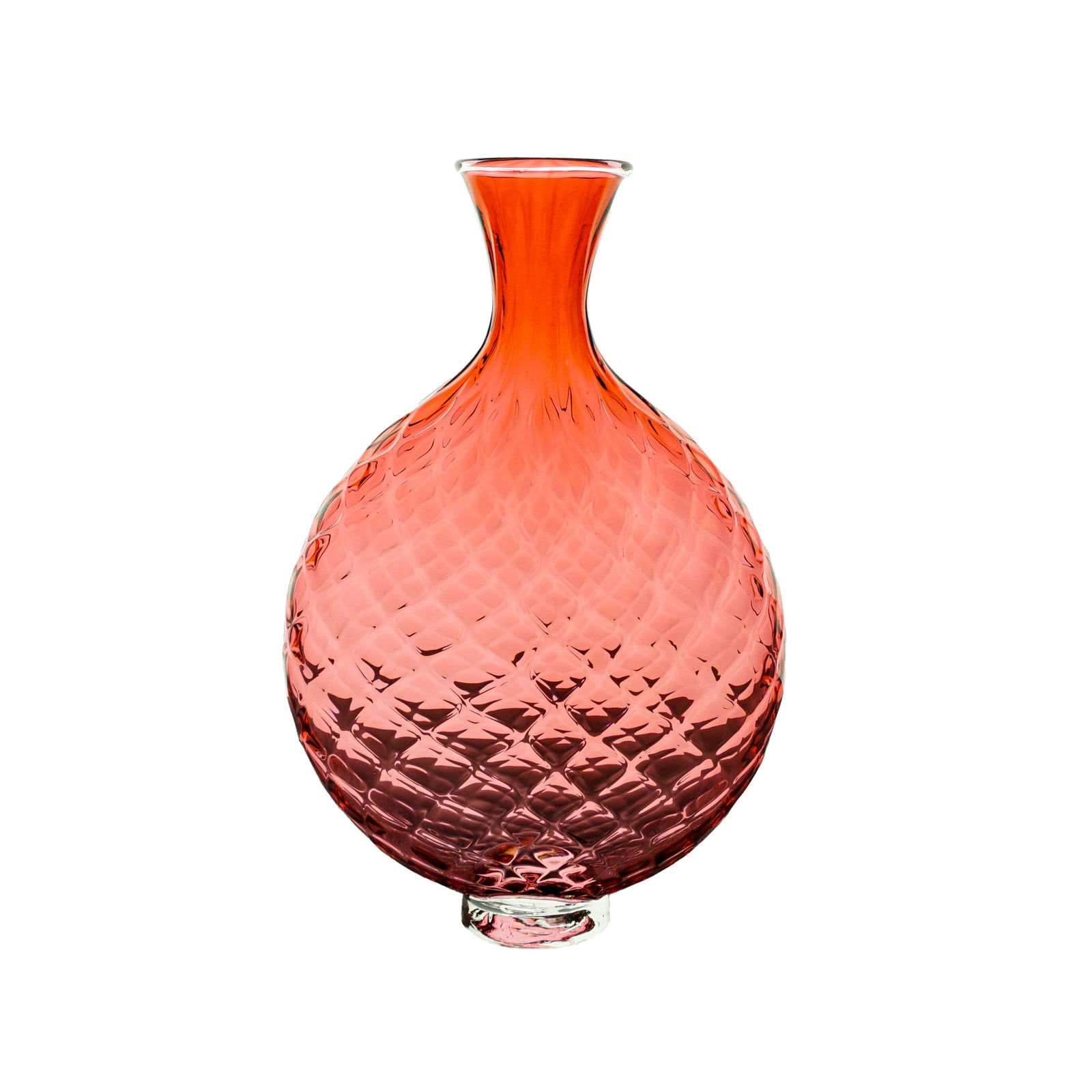 Coral-colored glass vase with textured surface on a white background