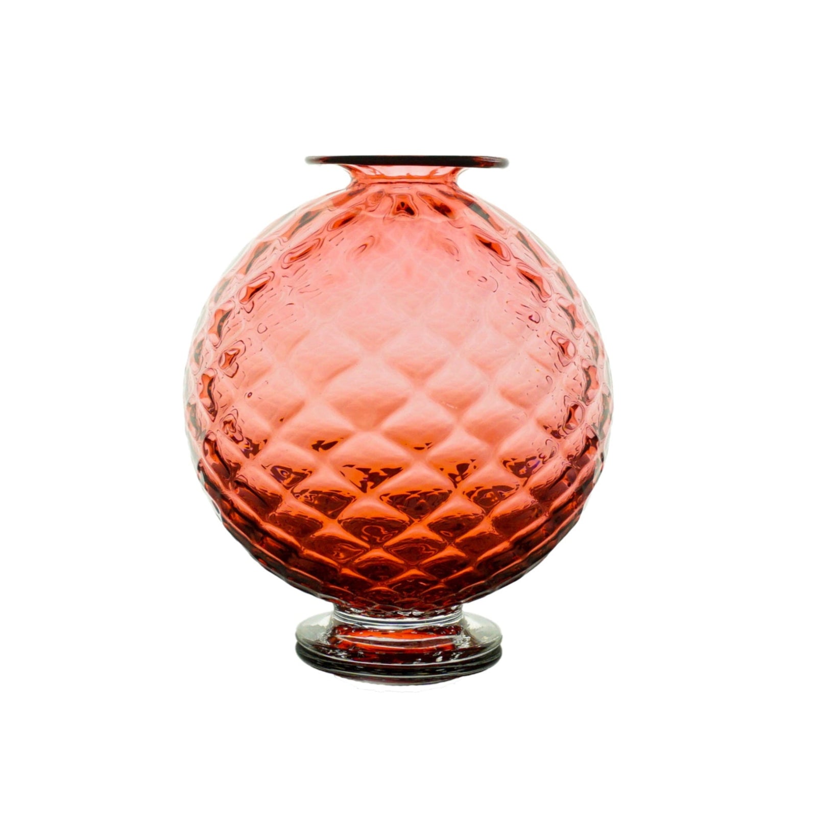 Pink textured glass vase on a white background