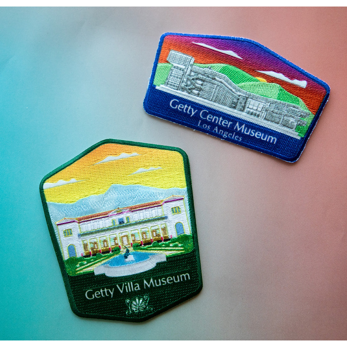 Patches depicting the Getty Center Museum and the Getty Villa Musuem