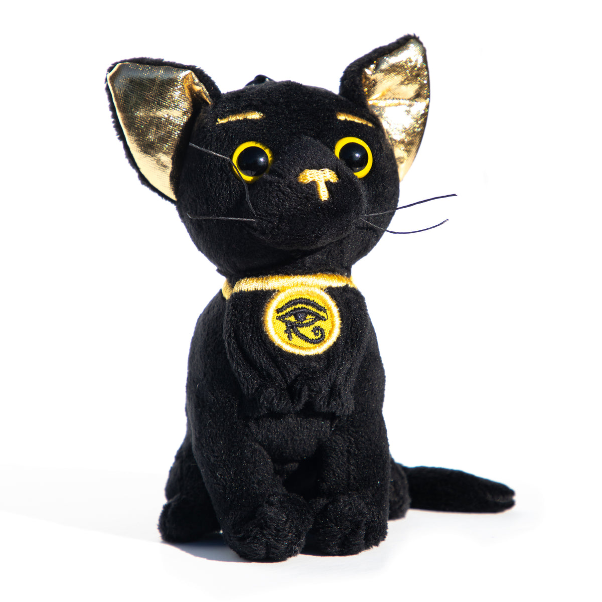 Black cat plush toy with gold accents on a white background