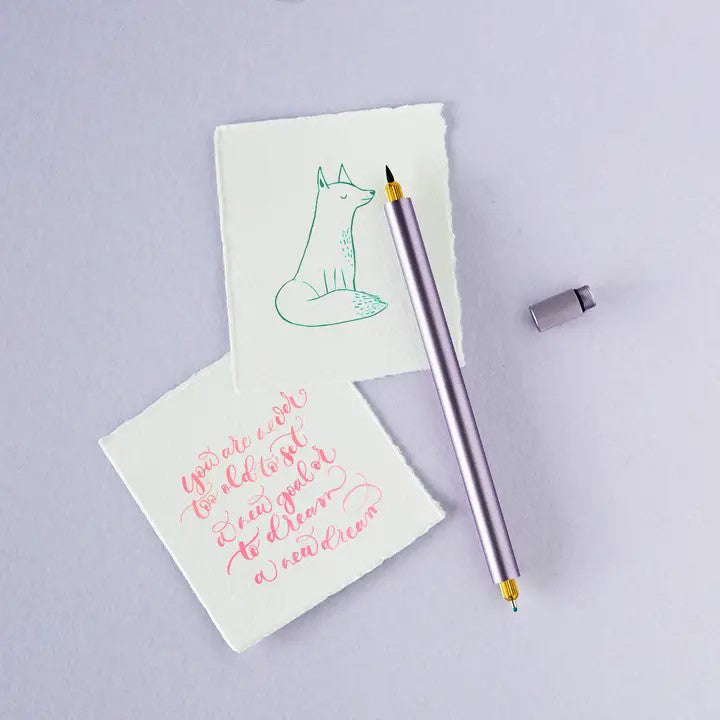 Pen with a cap on a white background