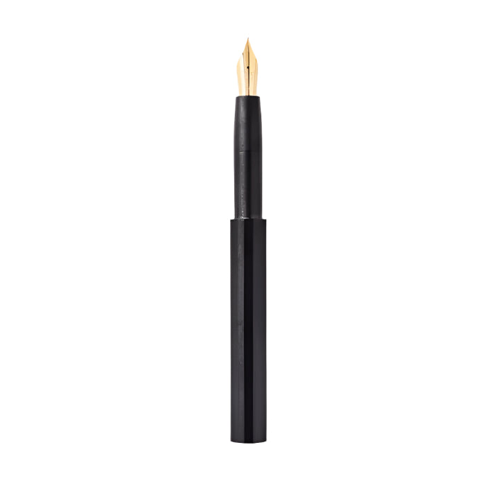 Black fountain pen with gold tip on a white background
