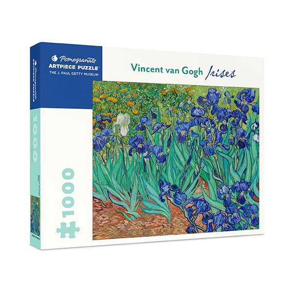 A 1000-piece jigsaw puzzle depicting the painting 'Irises' by Vincent van Gogh. The puzzle pieces are arranged on a surface to form part of the image, with the complete puzzle showing blue and green irises against a dirt ground with green foliage in the background.